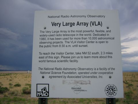 1999 Ford F-250 - A sign provides information about the Very Large Array (VLA) and directions to the visitor center.