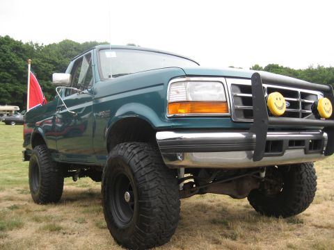 1996 Ford Bronco - This lifted Ford truck has a distinctive body style from the early to mid-1990s.