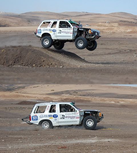 1992 Ford Explorer - This modified SUV is airborne during a desert race, its off-road capabilities.