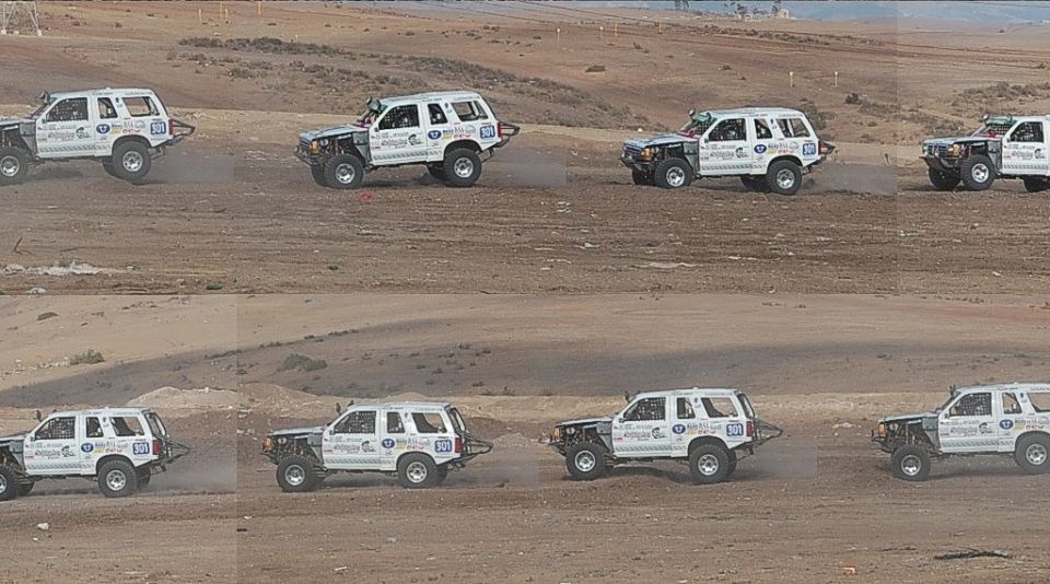White 1992 Ford Explorer SUVs racing off-road, side view
