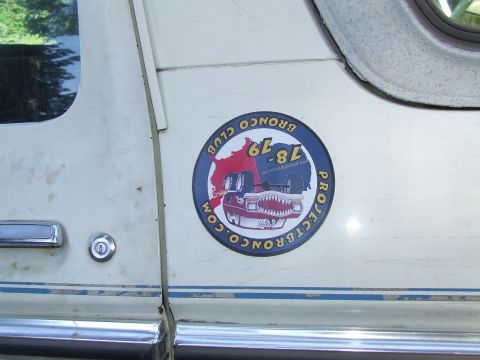 1979 Ford Bronco - A sticker on the side of a white vehicle indicates it is part of the 'Bronco Club 78-79' and features a 1979 Ford Bronco.