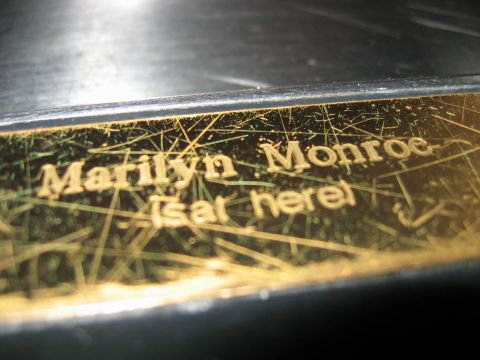 1985 Ford LTD Crown Victoria - Close-up of an engraved plaque with text that reads 'Marilyn Monroe' and 'Isar here!'.