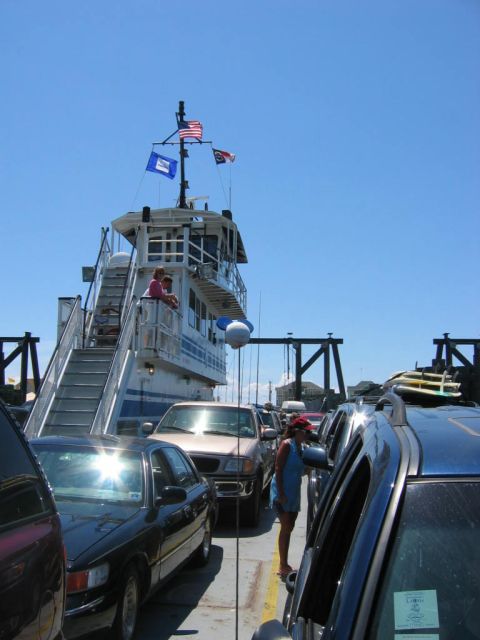1985 Ford LTD Crown Victoria - Cars are lined up on a ferry deck, waiting for transport.
