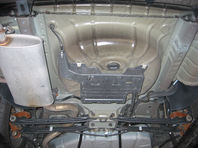 spare tire well and exhaust