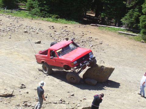 1989 Ford Bronco - This 1989 Ford Bronco is navigating a difficult obstacle on a rocky trail.