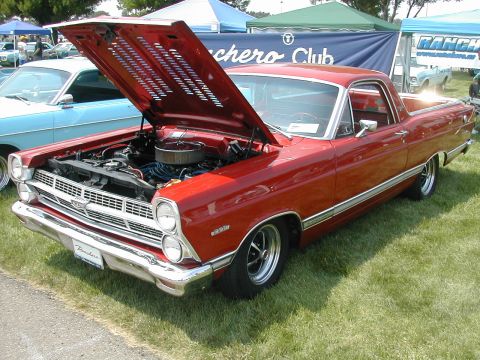 1972 Ford Ranchero - A red 1968 Ford Ranchero is displayed with its hood open, revealing the engine compartment.