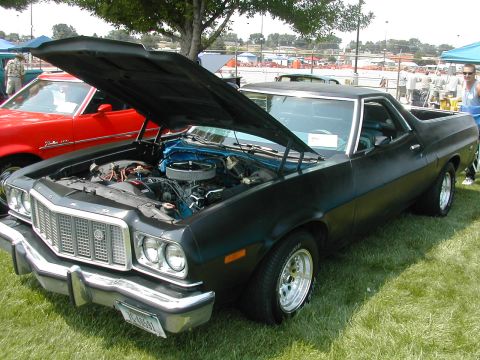 1972 Ford Ranchero - 1972 Ford Ranchero at a car show, hood open. Another vehicle is parked to the left.
