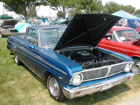 1972 Ford Ranchero - A blue 1963 Ford Falcon Ranchero is displayed with its hood open at an outdoor car show.