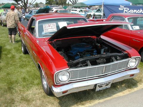 1972 Ford Ranchero - A red 1967 Ford Falcon Ranchero is displayed with its hood open at an outdoor car show.