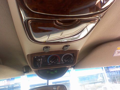 2000 Ford Excursion - AROUND THE CONTROLS IS A FABRIC WRAP