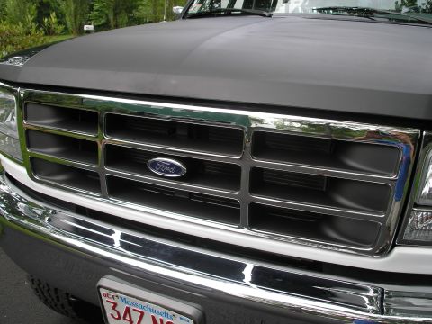 1994 Ford Bronco - Front grille of a 1992 Ford F-Series truck, showing chrome accents and the Ford logo.