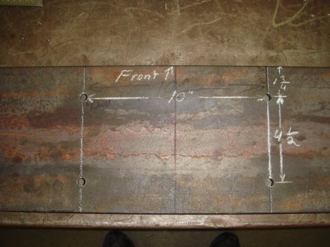 1996 Ford Bronco - A metal plate is marked with dimensions and directional indicators for a project.