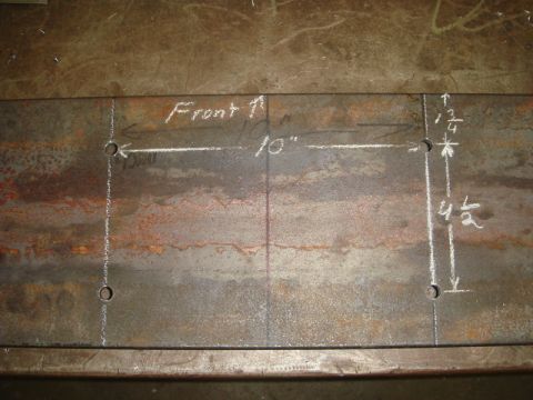 1996 Ford Bronco - Metal plate with chalk markings for a winch installation project.
