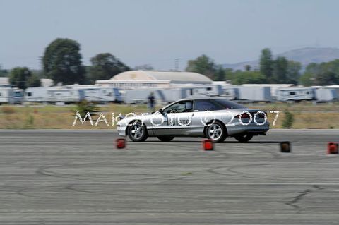 1993 Ford Probe - Silver 1993 Ford Probe seen on a race track during an autocross event.
