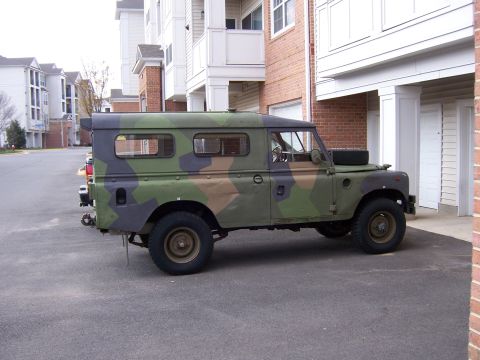 1974 Land Rover Land Rover - This 1974 Land Rover Defender is parked outside an apartment complex.
