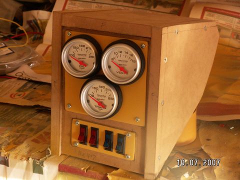 1983 Ford Bronco - under dash centre console for transmission tunnel....holds voltmeter, oil temp and trans temp gauges....red illuminated rocker switches for…