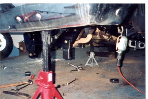 1989 Ford Bronco - Radius arm brackets relocated 18" back, clamped in place, now to drill new holes in the frame