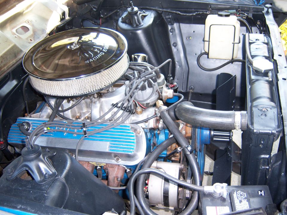 ahhh she runs like a top, really needs a duel plane edlebrock manifold, because of the cam there is very little manifold vacume, there are no flat spots or hesitations but would idle alot better with a duel plane