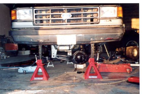 1989 Ford Bronco - Jacking the ends of the TTB up so we can tighten up the springs