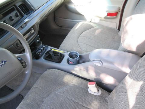2001 Ford Crown Victoria - 95 Taurus console installed. Lots of cutting and fitting to get it to work. Still not perfect but it's in there!