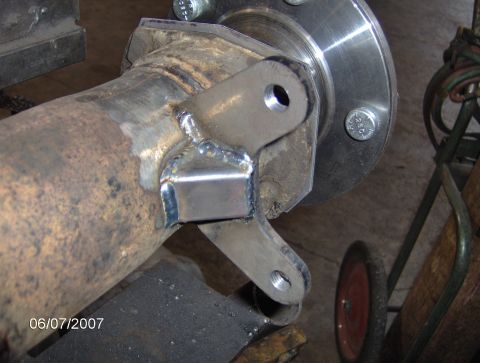 1978 Ford Bronco - A custom bracket is welded onto a vehicle's axle tube, likely for a brake upgrade. The date 06/07/2007 is visible.