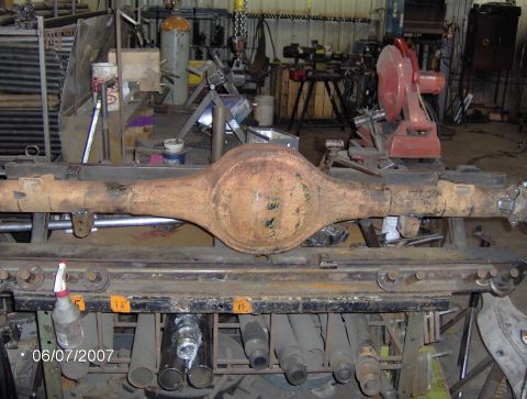 1978 Ford Bronco - Workshop scene with a rusty rear axle assembly as the main subject, dated 06/07/2007.