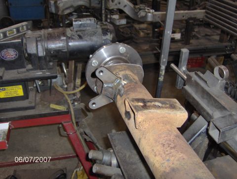 1978 Ford Bronco - Custom bracket welded to a rear axle assembly, likely for a disc brake conversion.