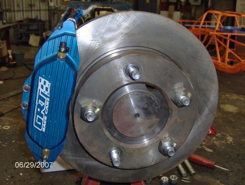 1978 Ford Bronco - Close-up of a blue GRT RACE CARS brake caliper installed on a vehicle's rotor, with a date stamp of 06/29/2007.