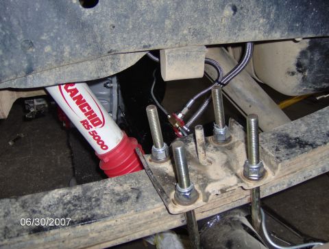1978 Ford Bronco - Close-up of rear suspension components, including a Rancho shock and U-bolts, with a date stamp of 06/30/2007.
