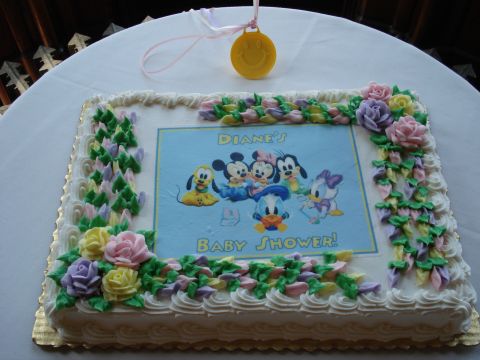 2000 Ford Crown Victoria - A decorated cake for Diane's baby shower features Mickey Mouse and friends.
