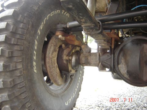 1993 Ford Bronco - This image shows the rear suspension and tire of an off-road vehicle, not a 1993 Ford Bronco.