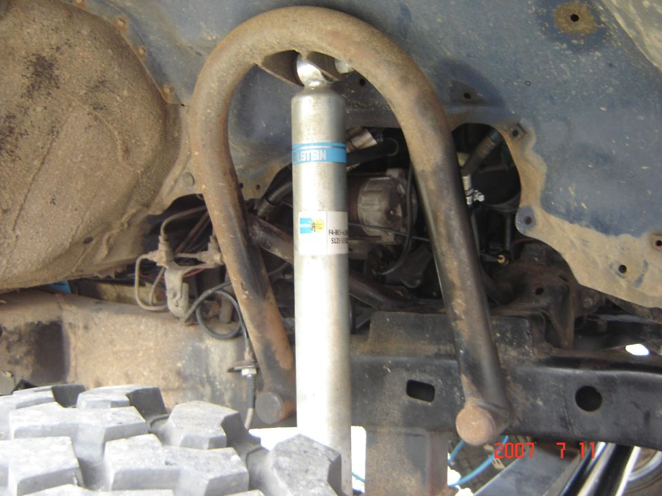 Rear suspension with Bilstein shock absorber and off-road tire