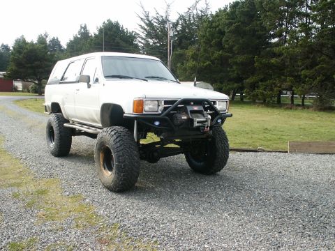 1993 Ford Bronco - Modified 1989 Toyota 4Runner on a gravel driveway, custom off-road modifications.
