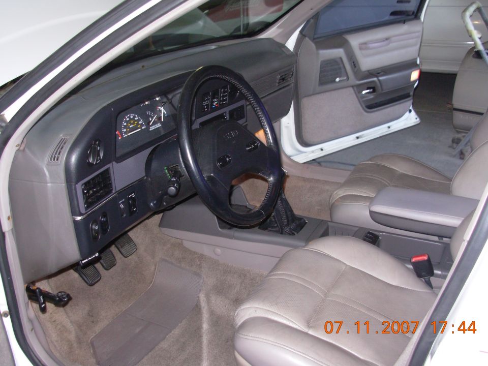 1995 Ford Taurus interior with tan seats and dashboard