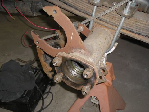 1990 Ford Bronco - This image shows a disassembled vehicle axle assembly, likely undergoing maintenance or repair.