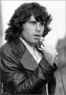 1992 Ford Bronco - Jim Morrison performing live, with "SUPER MOTORS" branding in the foreground.