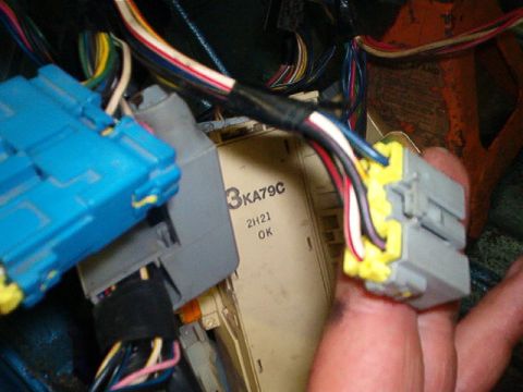 1993 Ford Probe - Wiring harness and connectors are visible in this close-up view.