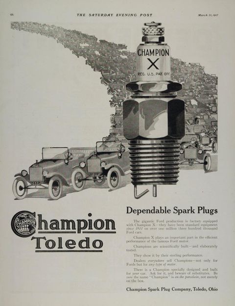 1913 Ford Model T - Advertisement for Champion Toledo spark plugs, a large spark plug and several vintage cars.