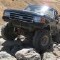 1989 Ford Bronco - This lifted 1987 Ford Bronco is navigating a rocky terrain.