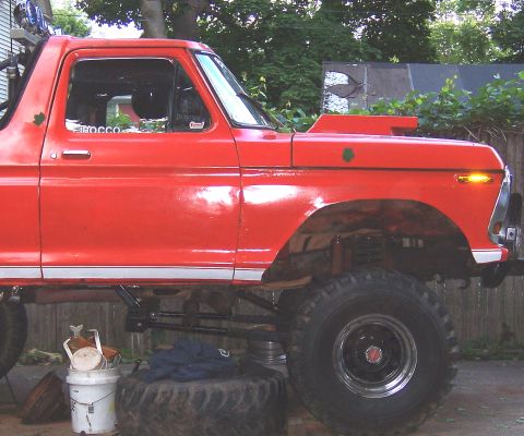 1978 Ford Bronco - This 1978 Ford Bronco features a custom hood scoop and lifted suspension.