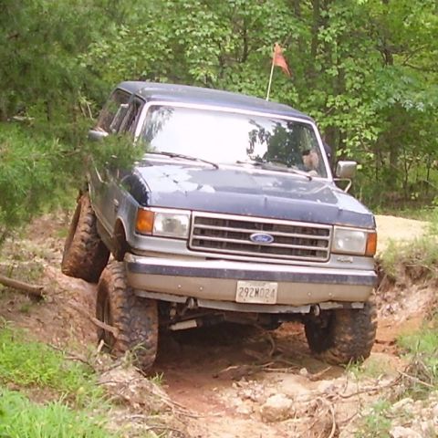1991 Ford Bronco - This 1991 Ford Bronco is navigating a challenging off-road trail.