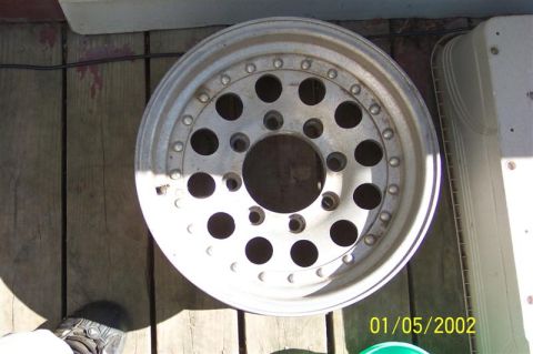 1978 Ford Bronco - Close-up of an aftermarket aluminum wheel, likely for a truck or SUV.