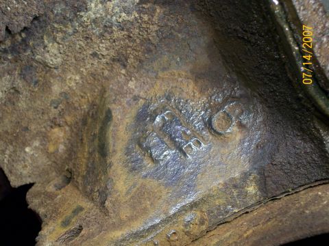 1992 Ford Bronco - Close-up of an engine block casting showing the numbers 'F1B0P' and a date stamp of July 14, 2007.