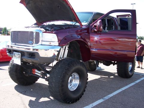 1972 Ford Ranchero - This heavily modified Ford truck features custom paint and an extreme lift kit.
