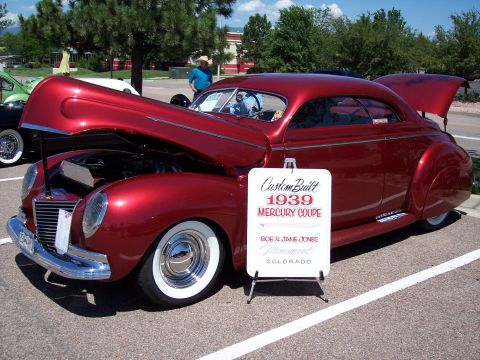 1972 Ford Ranchero - A custom-built 1939 Mercury Coupe is displayed with its hood and trunk open at an outdoor event.