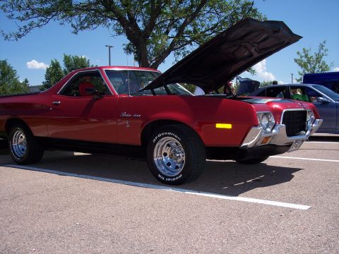 1972 Ford Ranchero - 1972 Ford Ranchero on display with its hood open, showing off its engine bay.