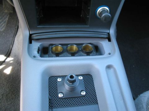 2001 Ford Crown Victoria - "Ashtray" open, extra power outlets for phone charger, GPS, stove, TV, microwave oven......