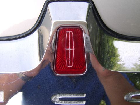 1996 Mercury Grand Marquis - After! I used candy apple red (transparent) paint on the backside with the shiny chrome behind to achieve the same pearlescent look as the…