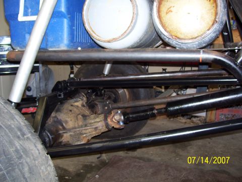 1978 Ford Bronco - Undercarriage view shows the drivetrain and suspension parts of a modified vehicle.