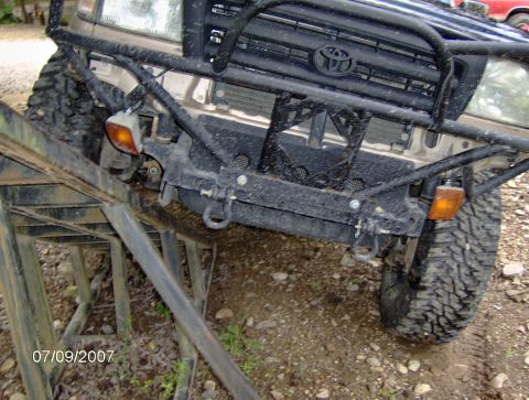 1978 Ford Bronco - Front view of a modified Toyota truck with aftermarket bumper and grille guard.